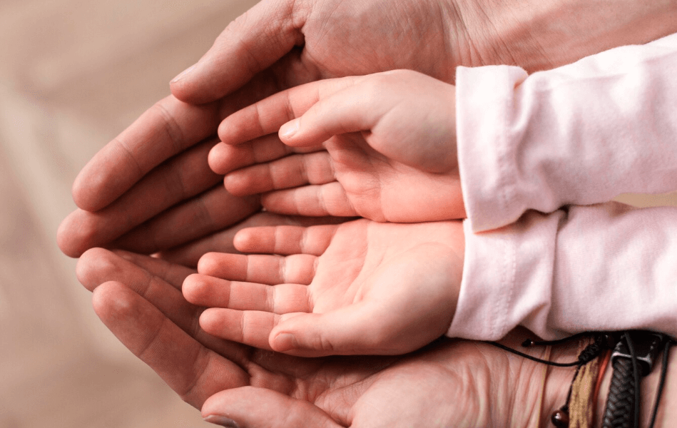 AFL-little-girl-putting-her-hands-in-fathers-hands (1)