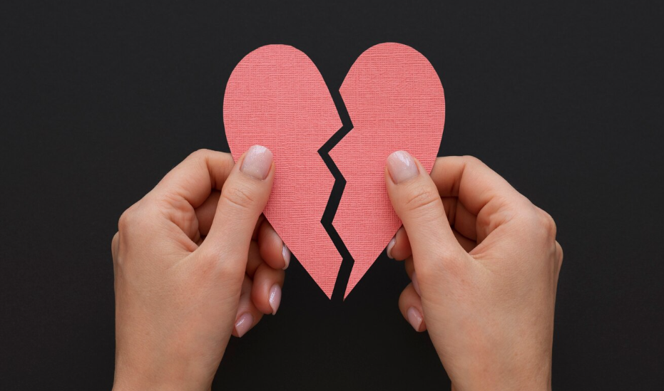 AFL - person holding broken heart